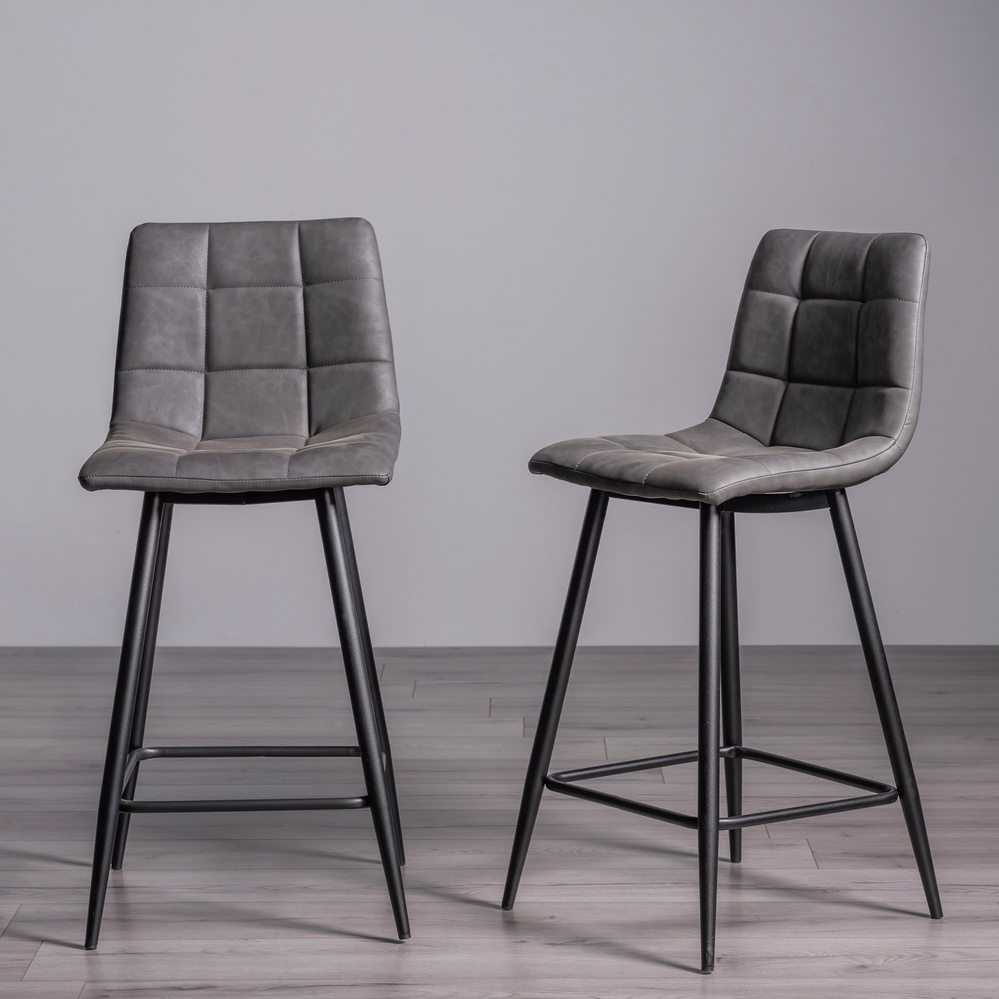Mondrian - Dark Grey Faux Leather Bar Stool with Black Legs (Pair) by Bentley Designs | Style Our Home
