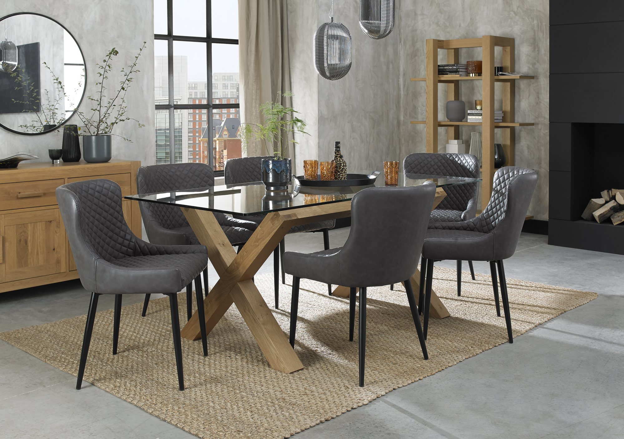Turin Glass 6 Seater Table - Light Oak Legs & 6 Cezanne Dark Grey Faux Leather Chairs - Black Legs by Bentley Designs | Style Our Home
