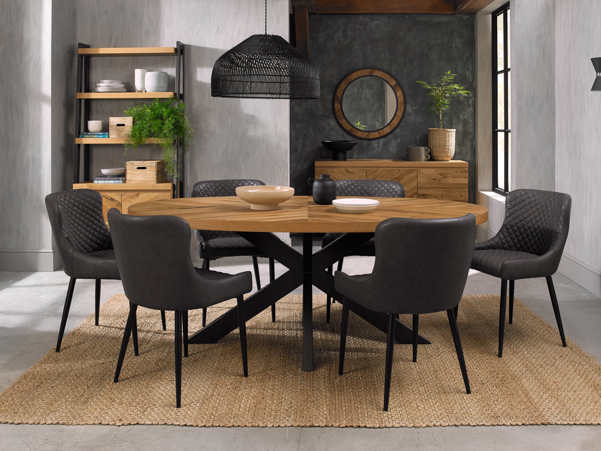 Ellipse Rustic Oak 6 Seater Table & 6 Cezanne Dark Grey Faux Leather Chairs - Black Legs by Bentley Designs | Style Our Home
