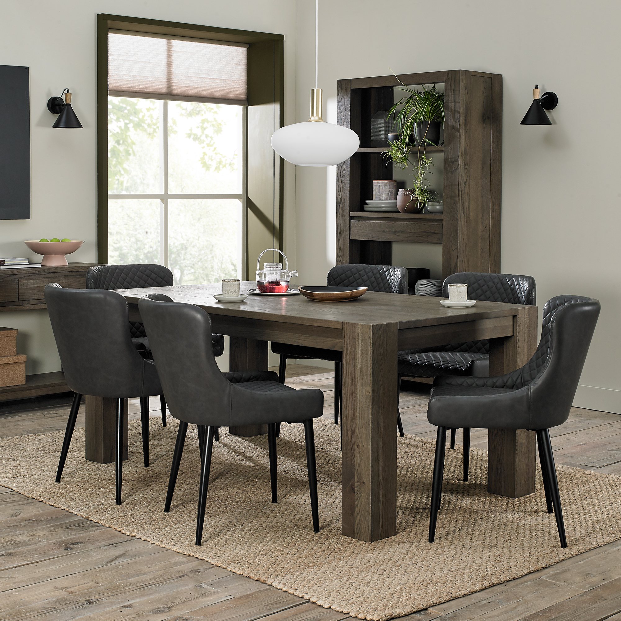 Logan Fumed Oak 6 Seater Table & 6 Cezanne Dark Grey Faux Leather Chairs - Black Legs by Bentley Designs | Style Our Home