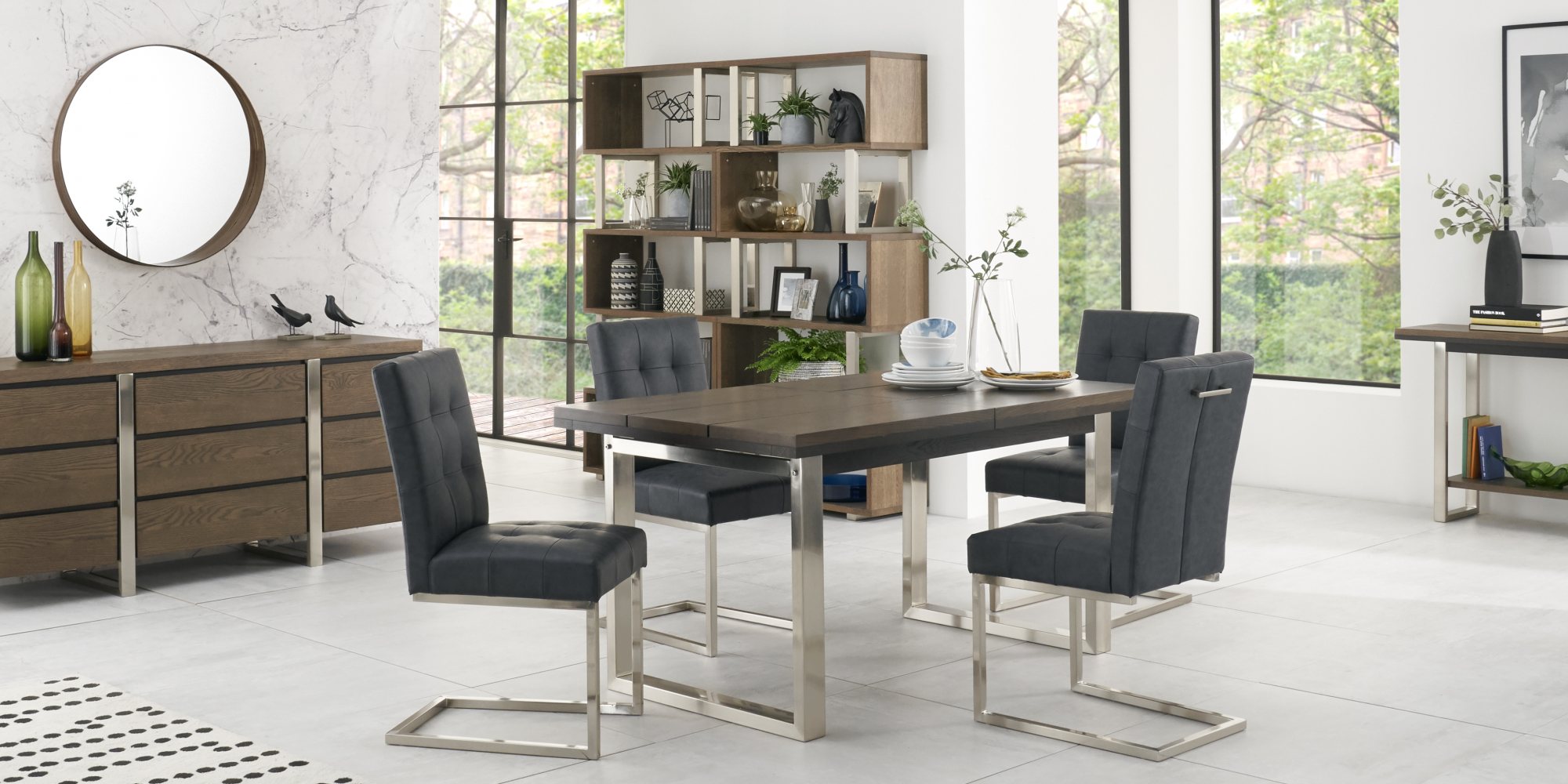 Tivoli Dark Oak 4-6 Seater Table & 4 Cantilever Chairs in Mottled Black Faux Leather by Bentley Designs | Style Our Home