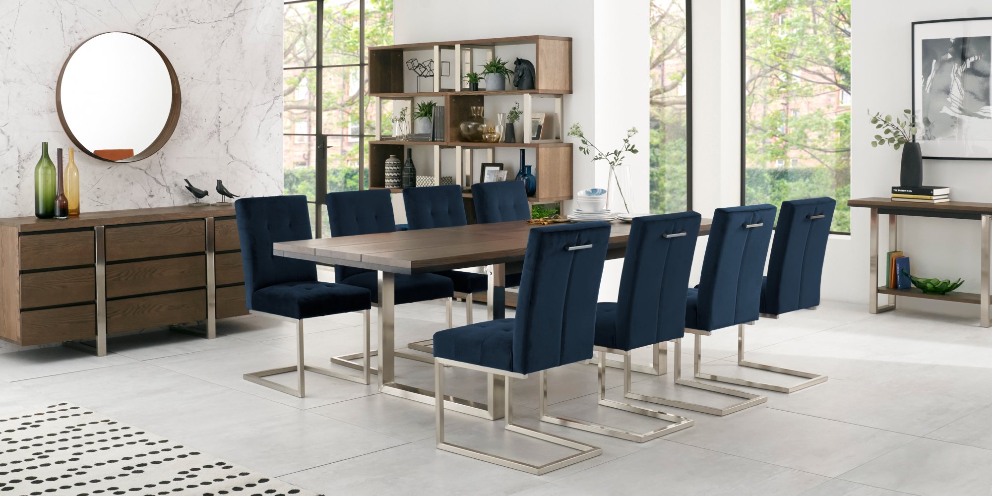 Tivoli Dark Oak 6-8 Seater Table & 8 Cantilever Chairs in Dark Blue Velvet by Bentley Designs | Style Our Home