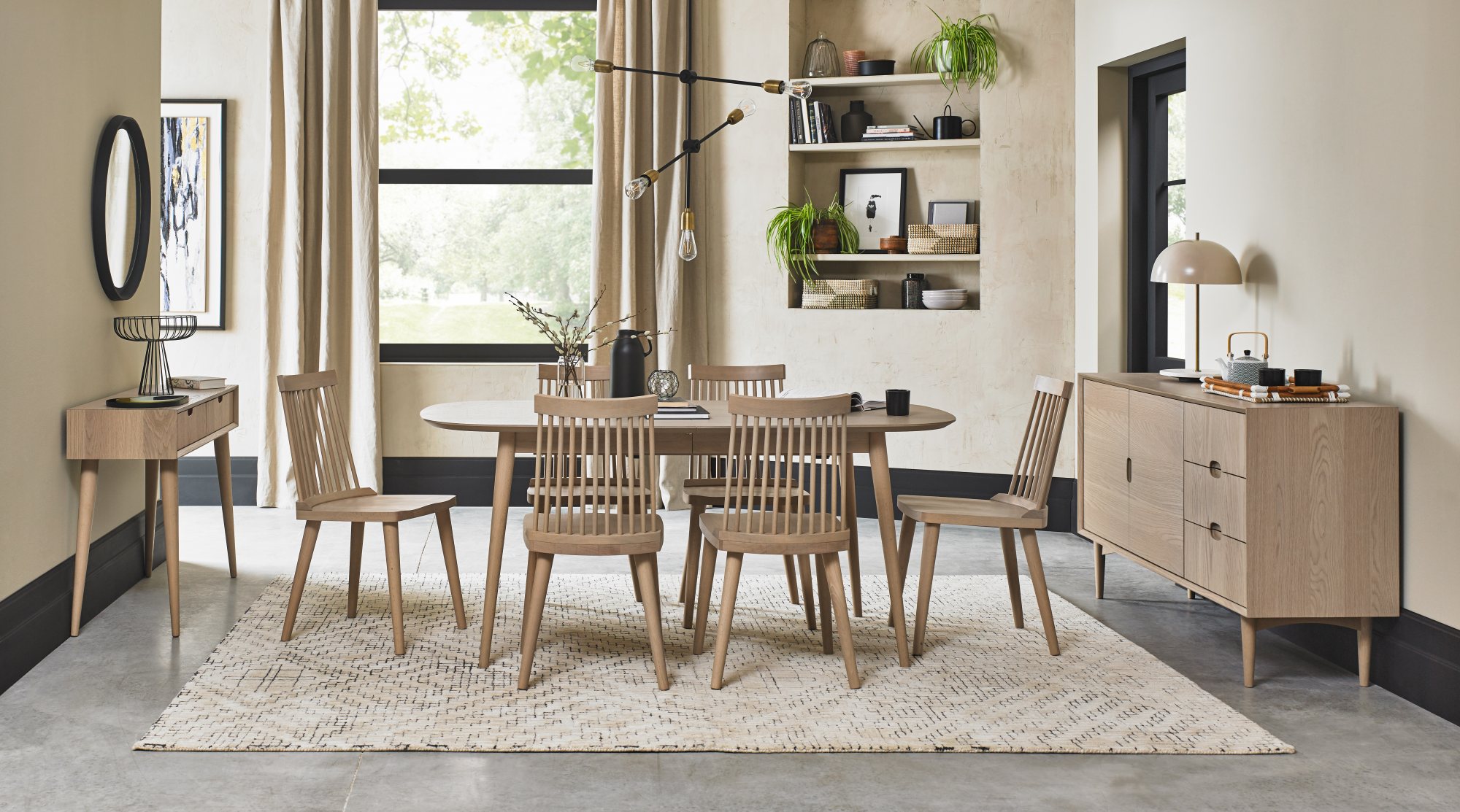 Dansk Scandi Oak 6-8 Seater Table & 6 Ilva Spindle Chairs in Scandi Oak by Bentley Designs | Style Our Home