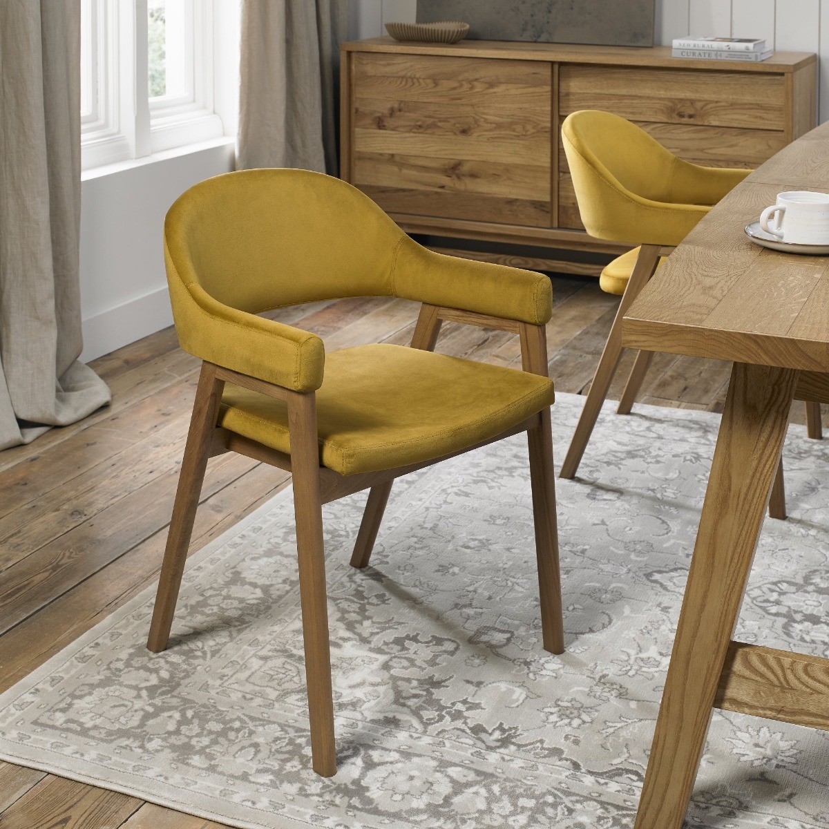Camden Rustic Oak Upholstered Arm Chair in a Dark Mustard Velvet Fabric (Pair) by Bentley Designs | Style Our Home