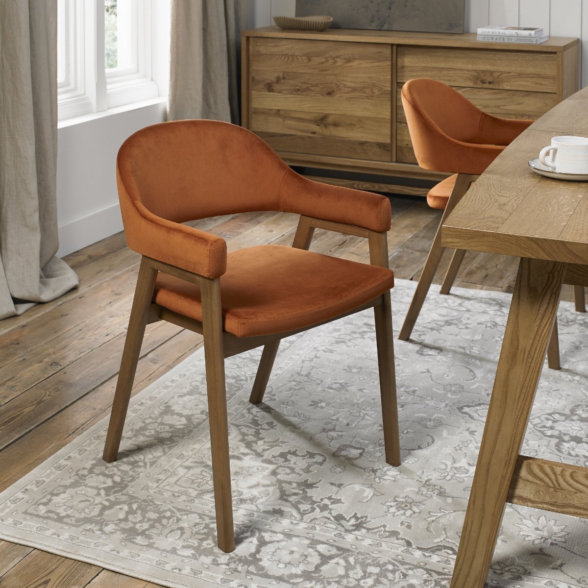 Camden Rustic Oak Upholstered Arm Chair in a Rust Velvet Fabric (Pair) by Bentley Designs | Style Our Home