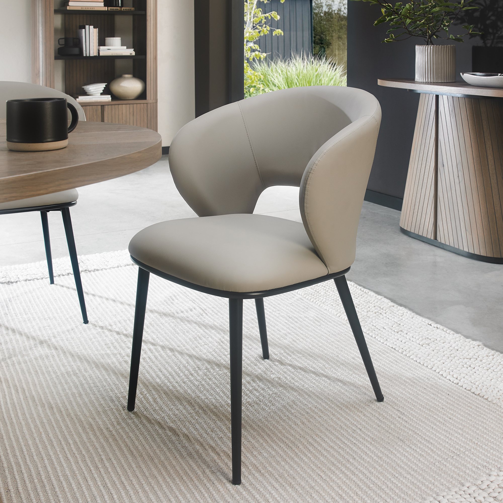 Luca - Grey Faux Leather Chair with Matt Black Legs (Pair) by Bentley Designs | Style Our Home