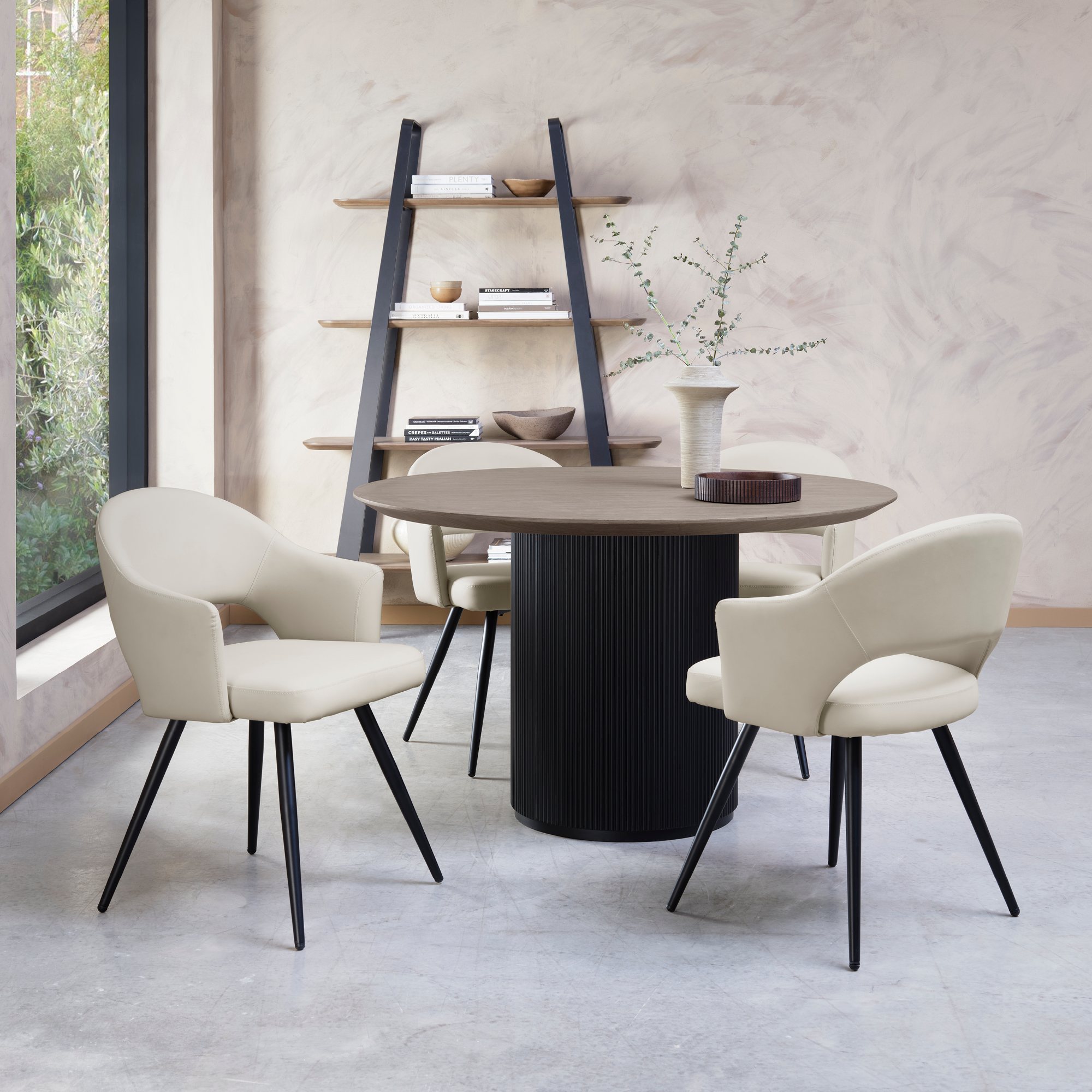 Jorge Grey Oak Round Dining Table with a Black Pedestal by Bentley Designs | Style Our Home