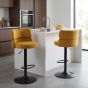 Meridston Mustard Upholstered Adjustable Swivel Bar Stool with Black Base (2pk) by Shankar | Style Our Home
