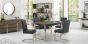 Tivoli Dark Oak 4-6 Seater Table & 4 Cantilever Chairs in Mottled Black Faux Leather by Bentley Designs | Style Our Home