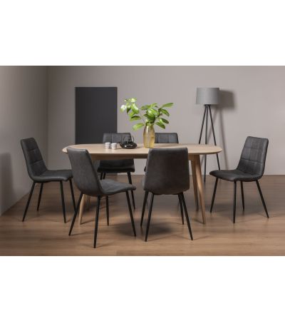 Dansk Scandi Oak 6 Seater Dining Table & 6 Mondrian Dark Grey Faux Leather Chairs with Sand Black Powder Coated Legs - Style Our Home