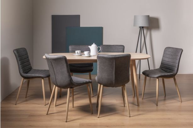 Dansk Scandi Oak 6 Seater Dining Table & 6 Eriksen Dark Grey Faux Leather Chairs with Grey Rustic Oak Effect Legs - Style Our Home