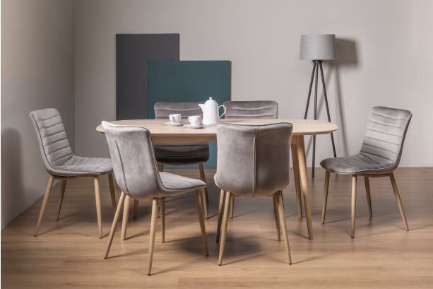 Dansk Scandi Oak 6 Seater Dining Table & 6 Eriksen Grey Velvet Fabric Chairs with Grey Rustic Oak Effect Legs - Style Our Home